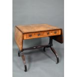 A Regency cross-banded burr walnut sofa table, with two frieze drawers opposing dummy drawer fronts,