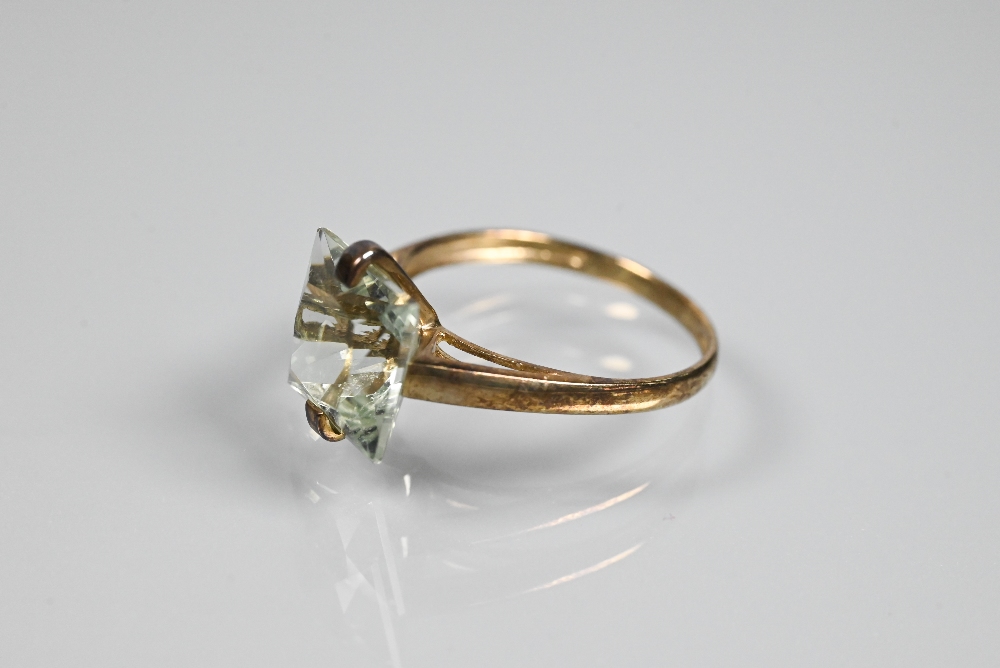 An oval aquamarine set in yellow metal scroll setting stamped 585, size O c/w accompanying - Image 3 of 9