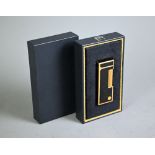 A Dunhill black enamel and gilt metal Rollagas cigarette lighter, in box, unused top of box missing