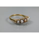 A Victorian pearl and diamond set ring, the five graduated pearls of differing colours, with rose