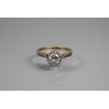 WITHDRAWN A single stone diamond ring, the diamond in rubover setting