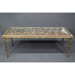 A 1930s faux bamboo framed coffee table, the glazed-in top of ivory and penwork inlaid rosewood, 118