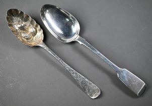 A berry spoon of Georgian origin, with engraved handle 20.5cm long, to/w a Victorian fiddle