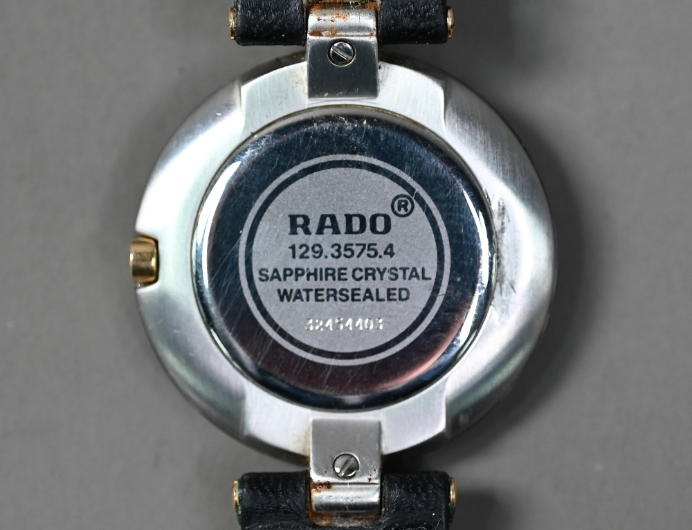 WITHDRAWN A Rado Dia Star wristwatch, black dial and gilt, with black leather strap, - Image 6 of 6