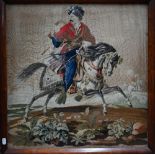 A 19th century needlework picture of an Ottoman cavalryman, 55 cm square, in glazed rosewood frame