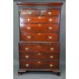 A Georgian mahogany chest on chest, the blind fret moulded cornice over two short and three long