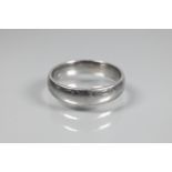 A wide platinum wedding band, size V, approx 11g