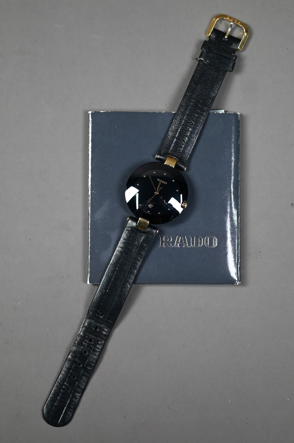 WITHDRAWN A Rado Dia Star wristwatch, black dial and gilt, with black leather strap, - Image 3 of 6
