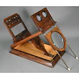 A Victorian walnut stereo card viewer in the manner of Negretti