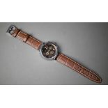 A Louis Vuitton Tambour gents wristwatch, the 40 mm dia. stainless steel case with brown metallic