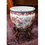 A large 20th century Chinese Imari fish bowl jardiniere, the exterior painted with floral designs,