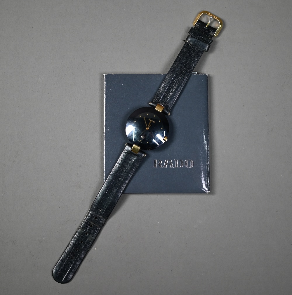 WITHDRAWN A Rado Dia Star wristwatch, black dial and gilt, with black leather strap, - Image 2 of 6