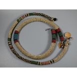Two early 20th century African tribal bead necklaces, bearing labels inscribed 'From Young Swazi