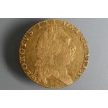 A George III gold half guinea dated 1793, 24mm diam, 8.4g
