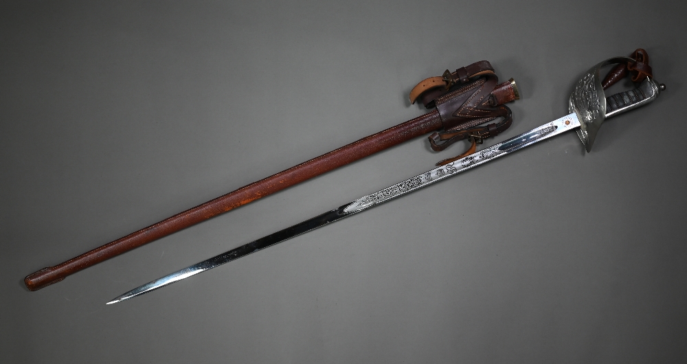 A George VI infantry officer's sword, the 83 cm unbranded blade etched with a crowned George VI