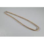 A yellow metal rope twist necklace on gilt metal clasp, 19cm long (closed), approx 5.8 g all in