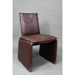 In the manner of Mario Bellini, an Italian single black leather chair in the style of the 'Break'