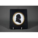 A Regency silhouette of a gentleman, by Miers & Field, 111 The Strand, London, 8 x 6.5 cm, in