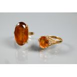 Two oval rings - one set with orange citrine and diamond to each side, size L, the other with oval
