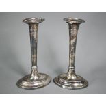 A pair of 19th Century Dutch .833 standard loaded candlesticks of elliptical form, with detachable