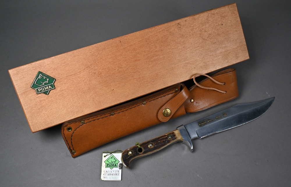 Puma Bowie knife with 20 cm blade and two piece antler handle, in leather scabbard and pine