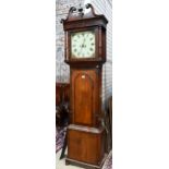 A Victorian oak and mahogany eight-day longcase clock, the oversize enamelled dial (35 cm x 35 cm)