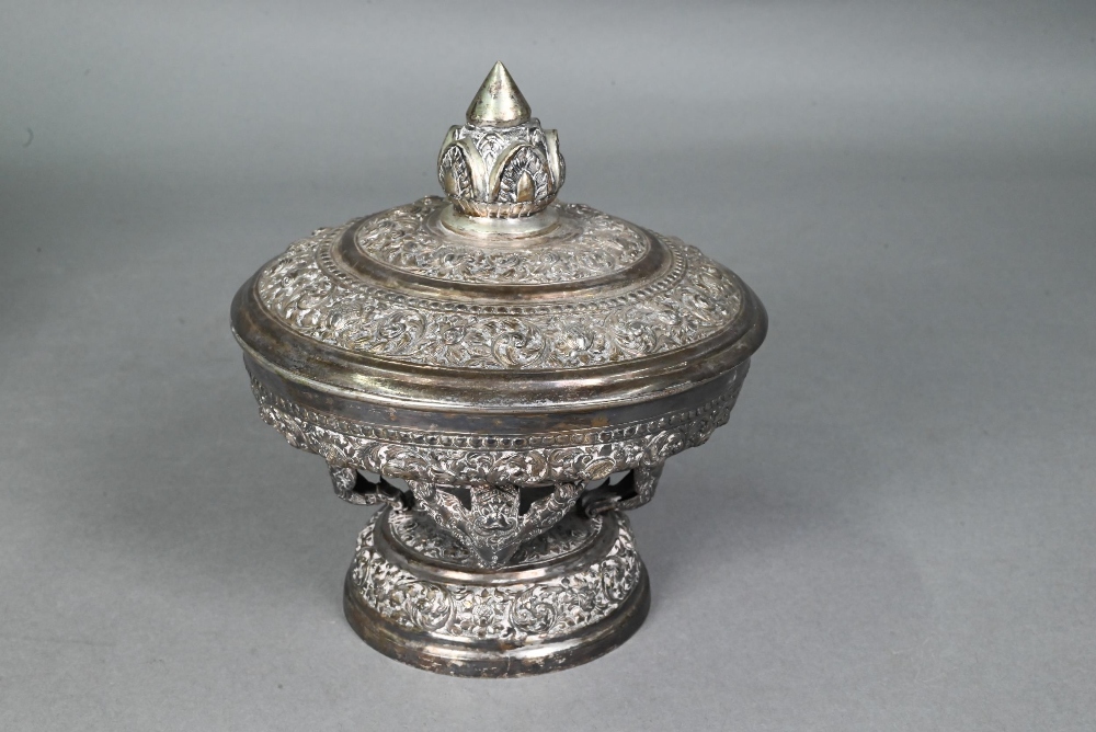 A South East Asian silver stem bowl and cover with lotus bud finial, profusely embossed and engraved - Image 2 of 10