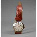 A vintage ladies Omega 9ct gold mechanical wristwatch on leather strap, circa 1967, the silvered
