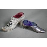 A Victorian silver novelty pin cushion as a lady's shoe, ornately embossed and chased, Henry