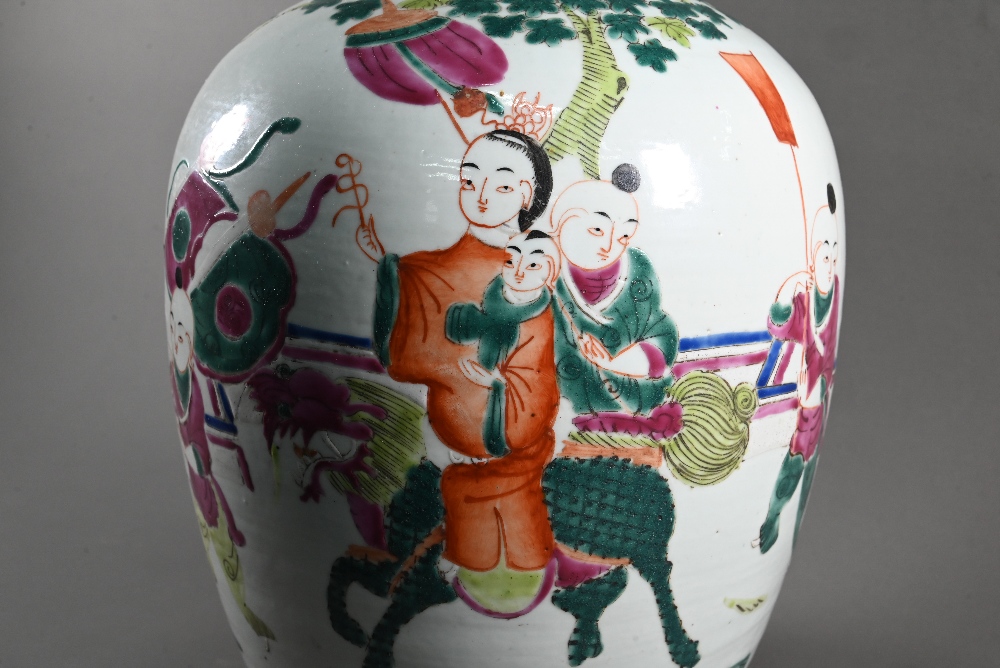 A pair of 19th century Chinese famille rose ovoid vases with covers (missing finials) painted in - Image 14 of 23