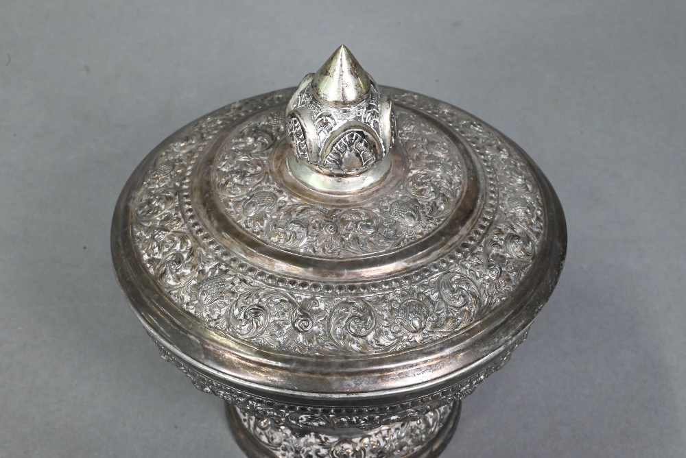 A South East Asian silver stem bowl and cover with lotus bud finial, profusely embossed and engraved - Image 5 of 10