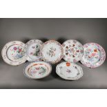 Six 18th century Chinese famille rose plates (four circular and two octagonal) painted with a