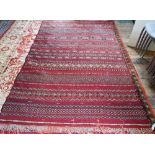 An old Persian Sumak flat weave carpet, the earth red ground  with multiple geometric design
