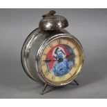 A WWII period Nuremburg rally clockwork alarm clock, the dial with portrait of Adolf Hitler before a