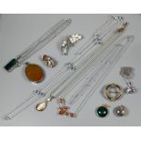 A small collection of costume jewellery including round pendant set possibly tourmaline, mother of