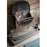 A large antique Adam style cast iron and steel fire grate, approx. 120 cm w x 39 cm deep x 96 cm h