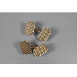 Two pairs of 9ct gold chain link cufflinks, one pair oval with foliate engraved decoration and one