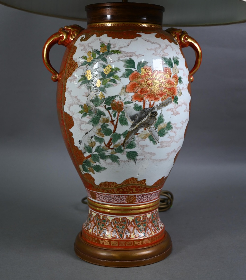A late 19th century Japanese Kutani vase (now lamp mounted) with mythical beast mask handles,