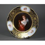 A Vienna porcelain cabinet plate, painted with 'Girl with a Candle' after Georges de la Tour, signed