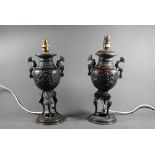 A pair of late 19th century Japanese bronze vases mounted as lamps, the baluster form bodies applied