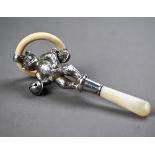 Silver 'teddy bear' baby's rattle with composite teething ring, two bells and mother of pearl