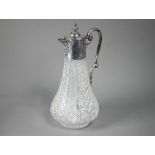 A late Victorian cut glass claret jug with silver collar, cover and handle, Hukin & Heath, London