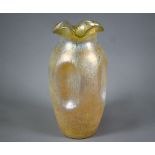 A large Loetz-type iridescent glass vase with wavy rim and dimpled body (unmarked), 28 cm