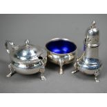 A silver three-piece condiment set in the Georgian taste, on hoof feet, William Suckling Ltd,