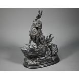 After Jules Moigniez (1835-1894) model of a hare and leveret on a rocky outcrop, titled Chasse
