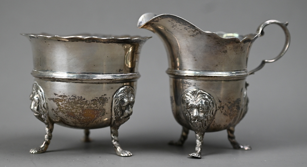An Edwardian silver cream & sugar pair, with cut rims, scroll handles and lion-mask monopodia, - Image 2 of 5