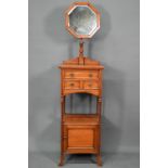 A circa 1900 dressing stand with octagonal framed adjustable mirror over three drawers and open
