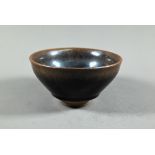 A Chinese Jianyao 'Hares fur' bowl, Southern Song dynasty style, covered with a thick unctuous black