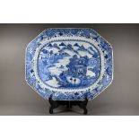 An 18th century Chinese blue and white platter of lobed octagonal form, painted with figures in