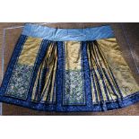 An early 20th century Chinese pleated skirt, Qun, late Qing or Republic period, the yellow damask
